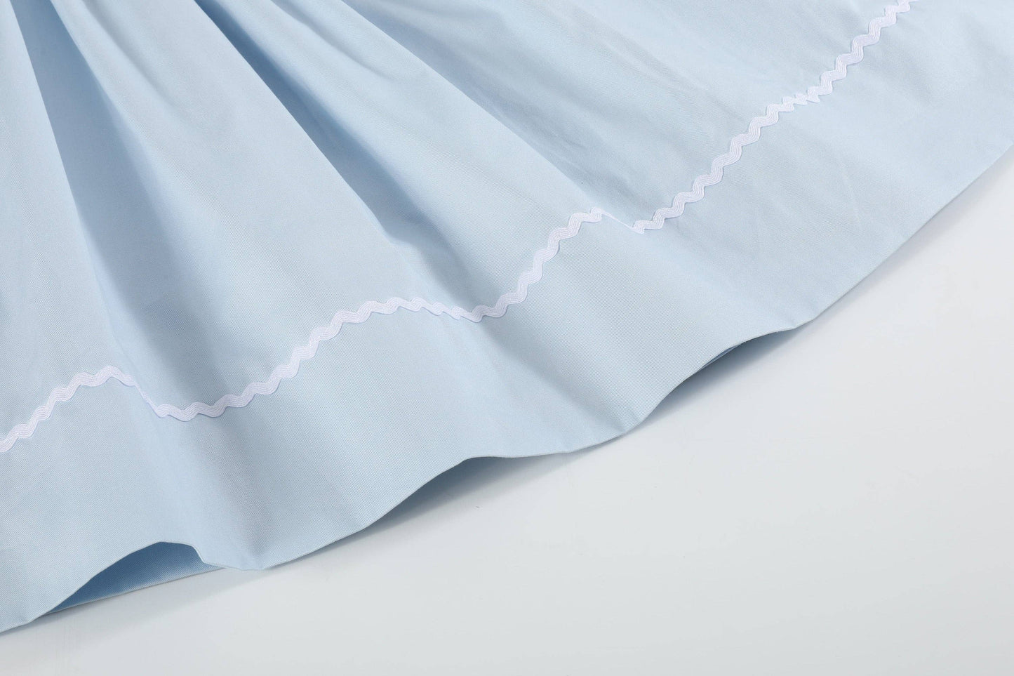 Blue Floral Crosses Smocked Bishop Girls Dress