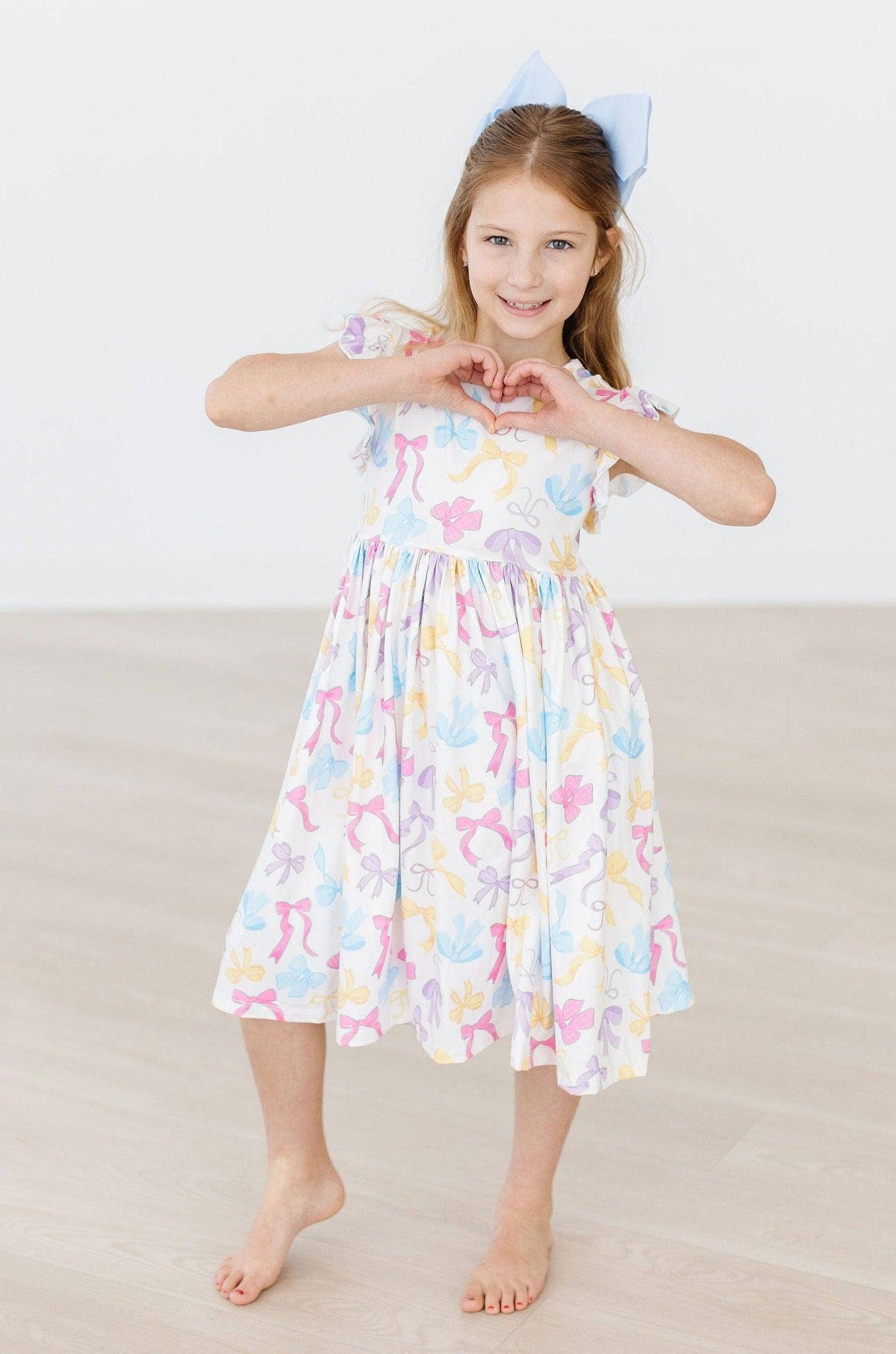 Bow-tastic Flutter Sleeve Girls Twirl Dress